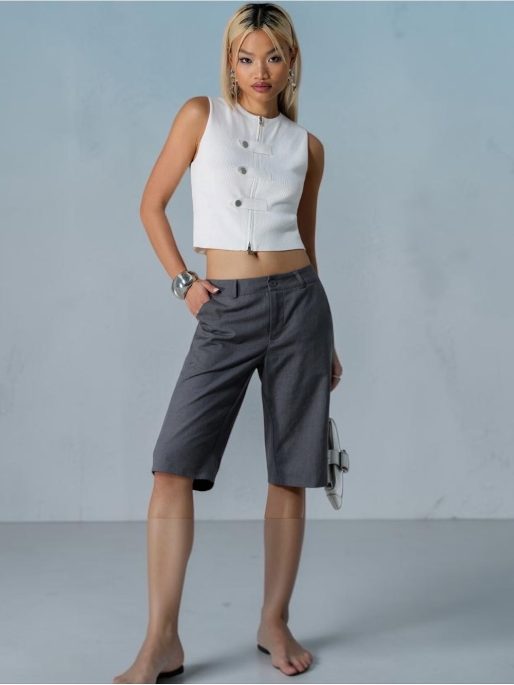 tailored longline grey shorts with a sleek woven fabric and a modern high-rise